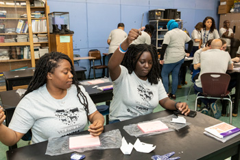 High school students practice suturing during 'Vet for a Day' event at AVMA Convention 2022 in Philadelphia