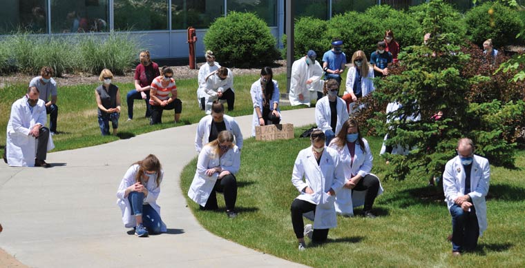 ISU collective kneel in support of White Coats for Black Lives
