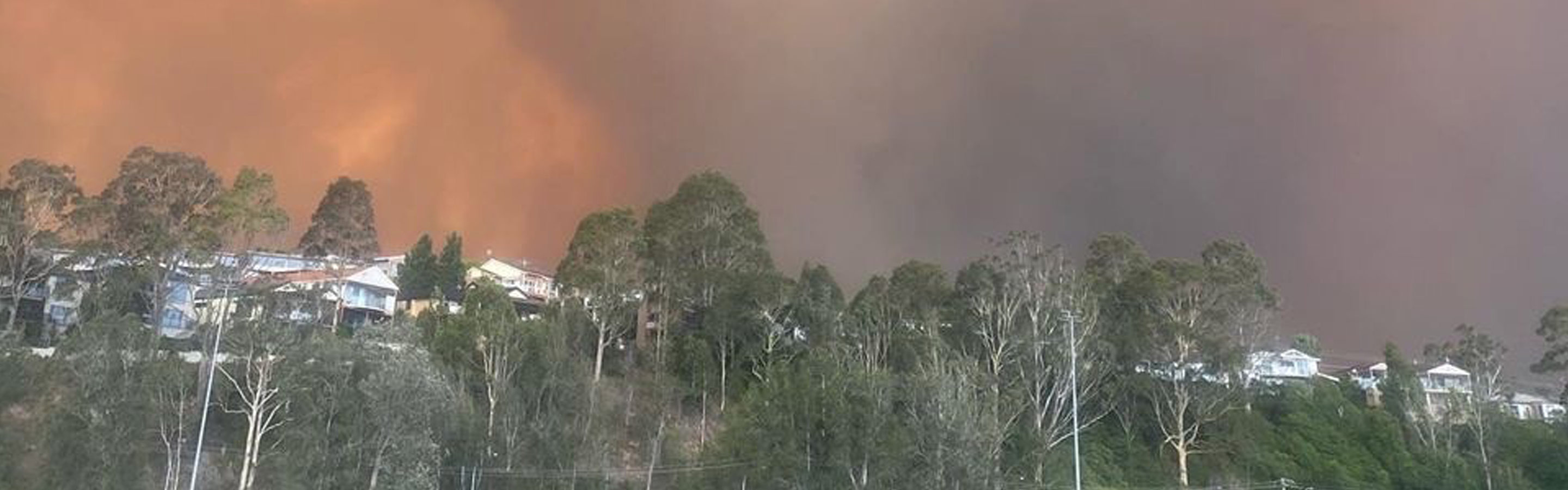 The sky is smoky and orange due to wildfires in Australia.