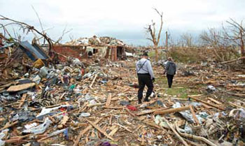 Humane Society responders search the Joplin tornado debris