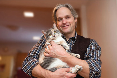 Dr. Hunt with feline companion