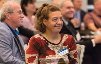 Smiling female attendee